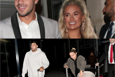 Molly-Mae Hague and Tommy Fury are back at Manchester Airport following their visit to Dubai with their daughter Bambi, amidst controversy over ‘fake messages’ and speculation about a new baby!