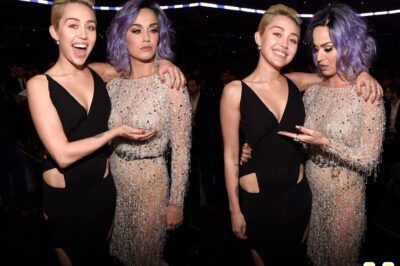 What Teenage Dreams are made of! Miley Cyrus playfully fondles fellow pop princess Katy Perry’s chest at the Grammys